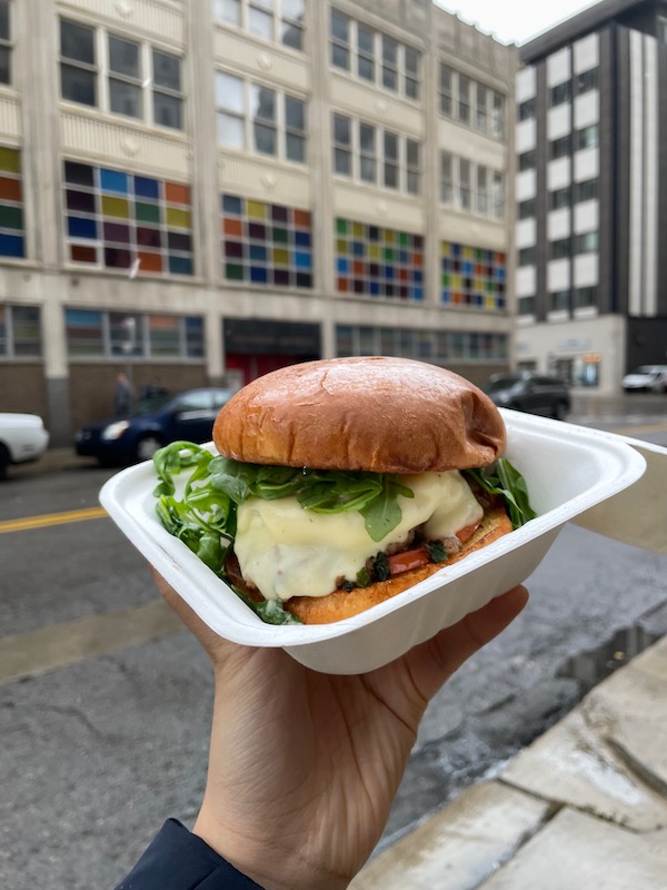 Egg burger with background of Detroit