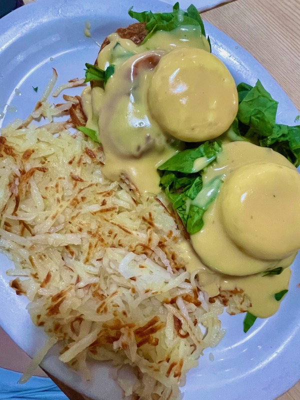 Two egg benedicts with hashbrowns