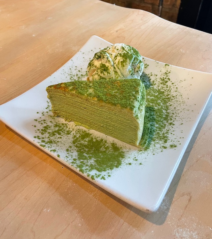 Slice of layered matcha cake